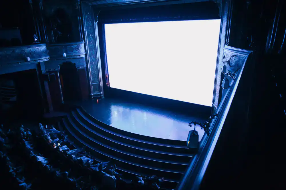 Wide shot of the stage lighting and audience